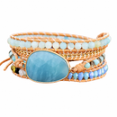 SkyFlow — Pulseira Boho Azul sobre fundo branco